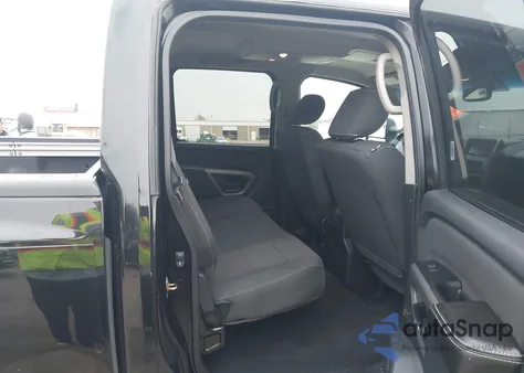 2015 Nissan Titan Pro-4X z USA, uszkodzony, nr VIN 1N6BA0EC3FN503443